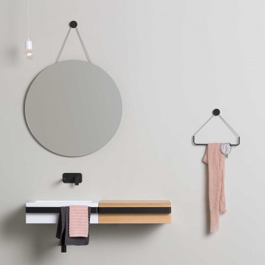 Wall-mounted rounded mirror...